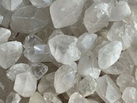 a close up image of a pile of white crystals