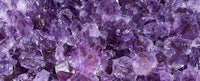 purple amethyst crystals in a close up view